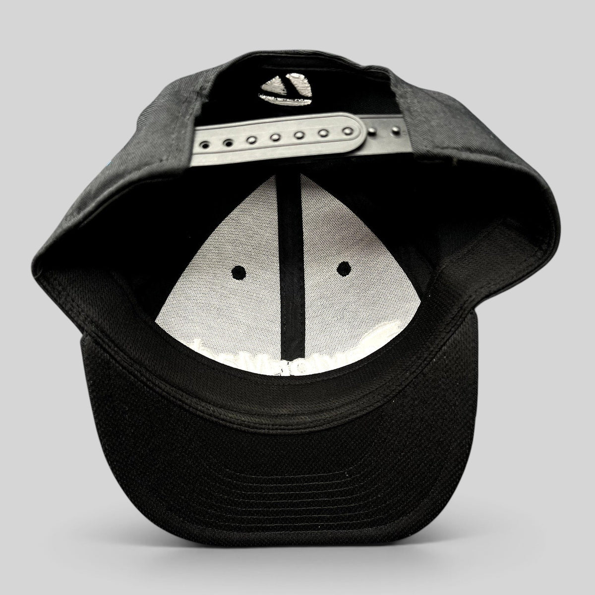 Raree Finds TaylorMade TP5 golf snapback hat interior view showing adjustable strap and structured black crown