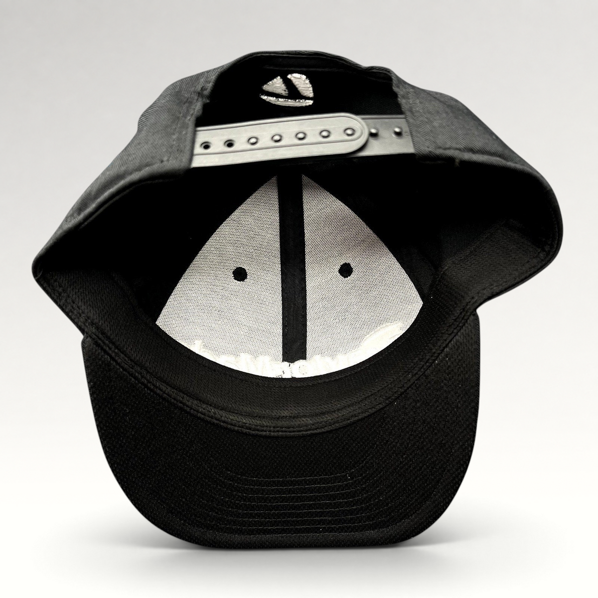 Raree Finds TaylorMade TP5 golf snapback hat interior view showing adjustable strap and structured black crown