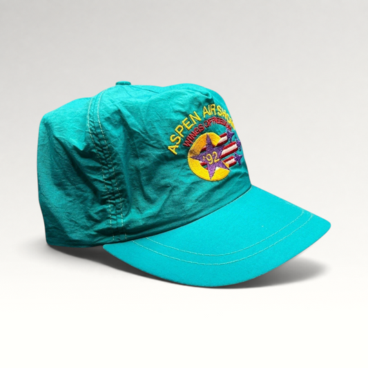 Raree Finds vintage 1992 Aspen Air Show teal nylon snapback hat with Wings of Freedom embroidered graphic