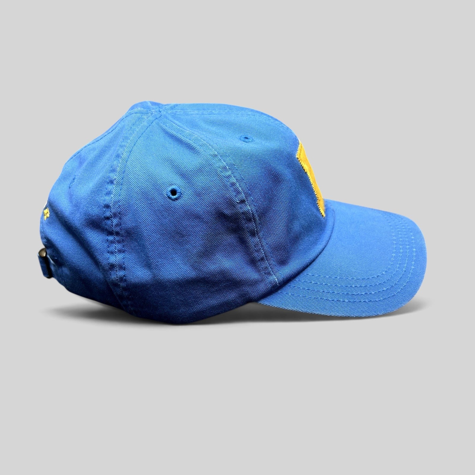 Raree Finds Ted Baker royal blue cotton dad cap with yellow chenille B logo and adjustable brass buckle strap