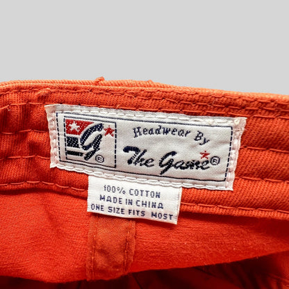 Raree Finds vintage The Game Headwear red cotton hat interior label showing brand logo and material details
