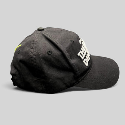 Raree Finds black Disney Pixar The Good Dinosaur strapback hat with white embroidered logo and curved brim