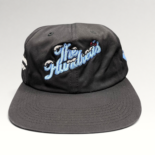 Raree Finds black cotton snapback hat from The Hundreds x Hello Kitty 2021 collaboration with blue embroidered script.