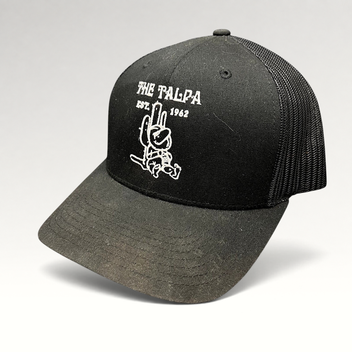Raree Finds black Yupoong trucker snapback hat featuring The Talpa Est. 1962 embroidered cactus mascot logo