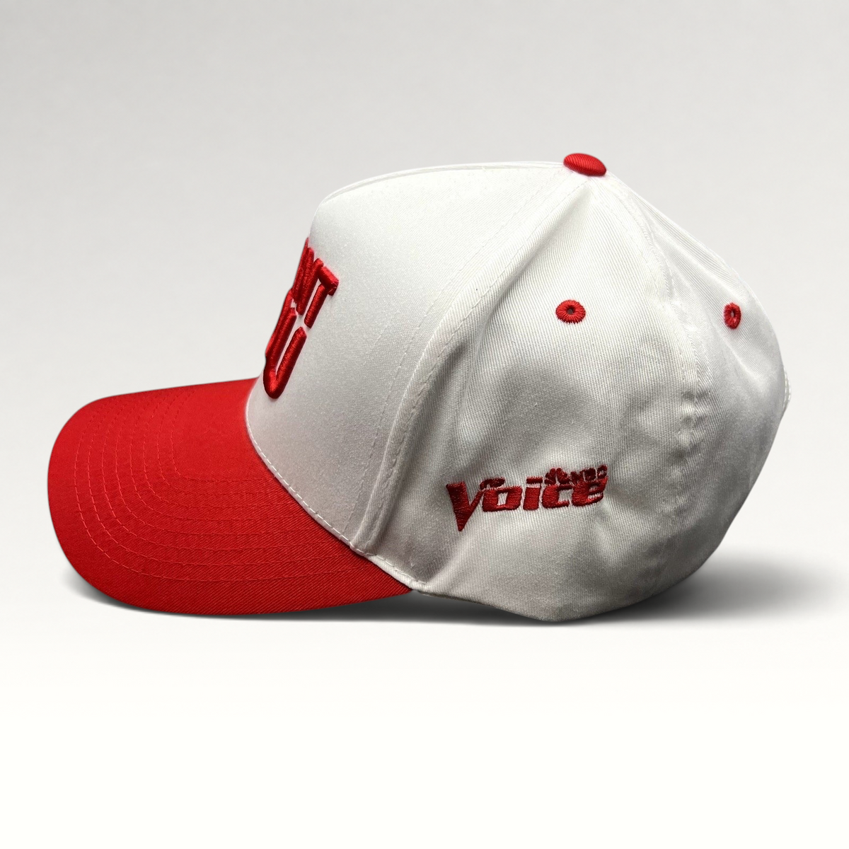 Raree Finds The Voice I Want You snapback hat with a white crown, red brim, and red embroidered side logo.