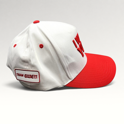 Raree Finds The Voice snapback hat with white crown, red brim, and Team Gwen embroidered patch on the side.