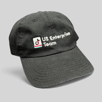 Raree Finds black TikTok US Enterprise Team strapback hat with embroidered logo on a structured crown