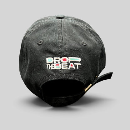 Raree Finds black TikTok strapback hat with colorful Drop The Beat embroidery on the back and brass buckle closure