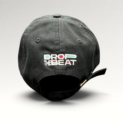 Raree Finds black TikTok strapback hat with colorful Drop The Beat embroidery on the back and brass buckle closure