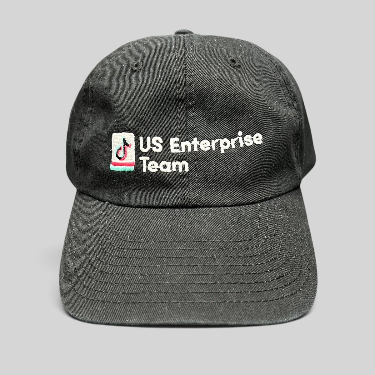 Raree Finds black TikTok US Enterprise Team strapback hat with embroidered logo on the front and curved brim