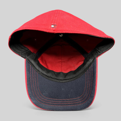 Raree Finds Tommy Hilfiger red fitted hat showing the interior construction, black sweatband, and dark undervisor.