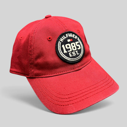 Raree Finds Tommy Hilfiger red fitted hat with 1985 EST circular embroidered patch and curved brim