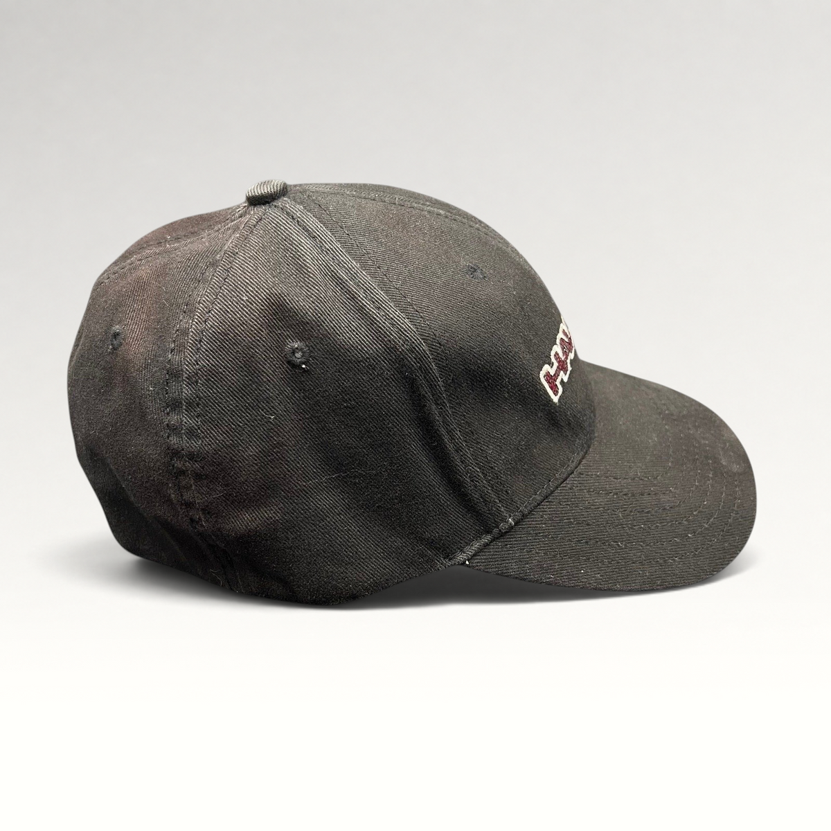 Raree Finds youth Tony Hawk black fitted skate hat with embroidered HAWK wordmark and bird logo in red and white