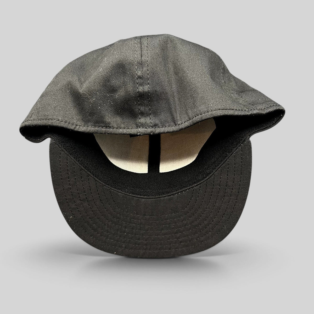 Raree Finds Tony Hawk Clothing black strapback hat with a curved bill and structured six-panel design