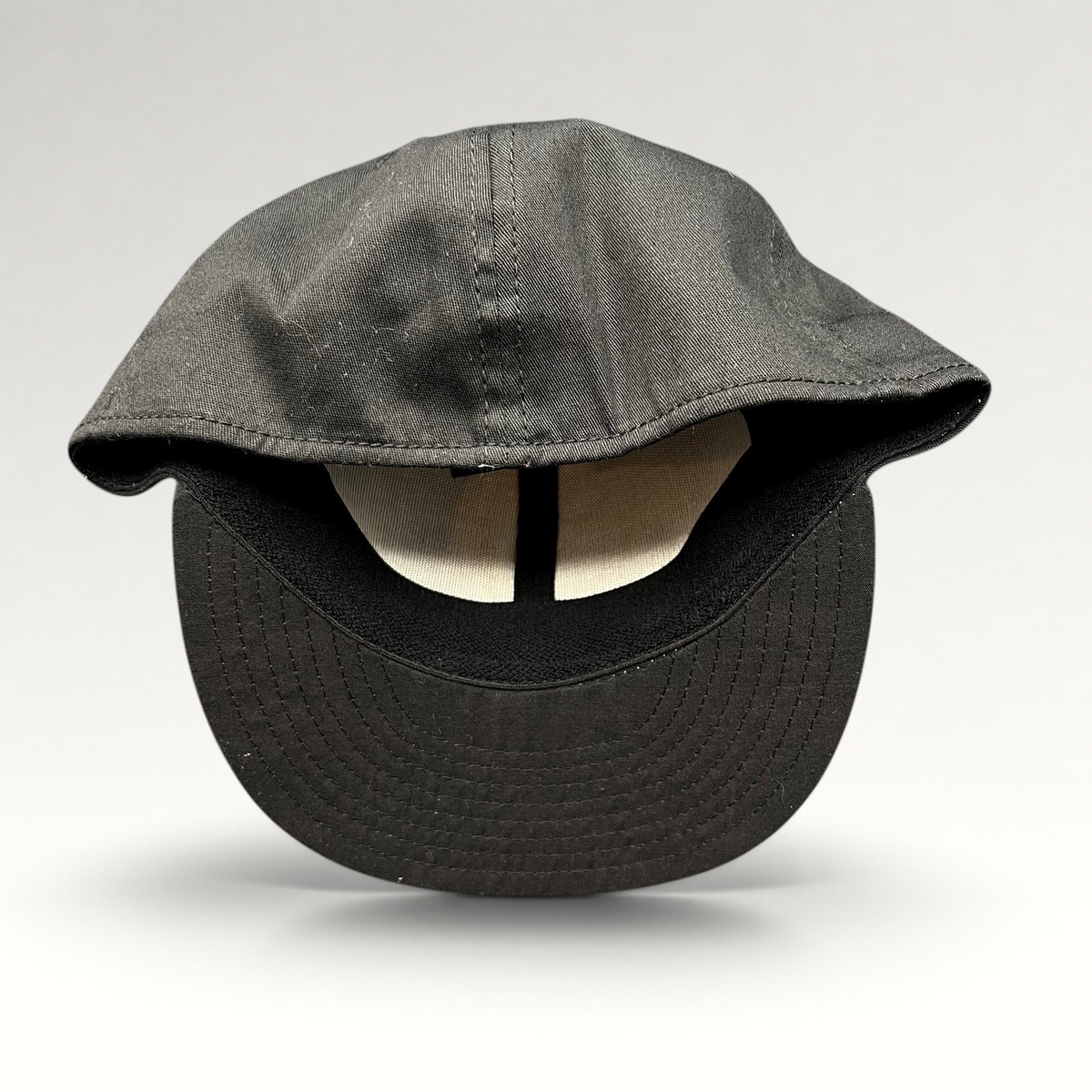 Raree Finds Tony Hawk Clothing black strapback hat with a curved bill and structured six-panel design