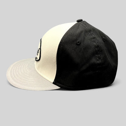 Raree Finds Tony Hawk black and white strapback hat with curved bill and embroidered script logo patch