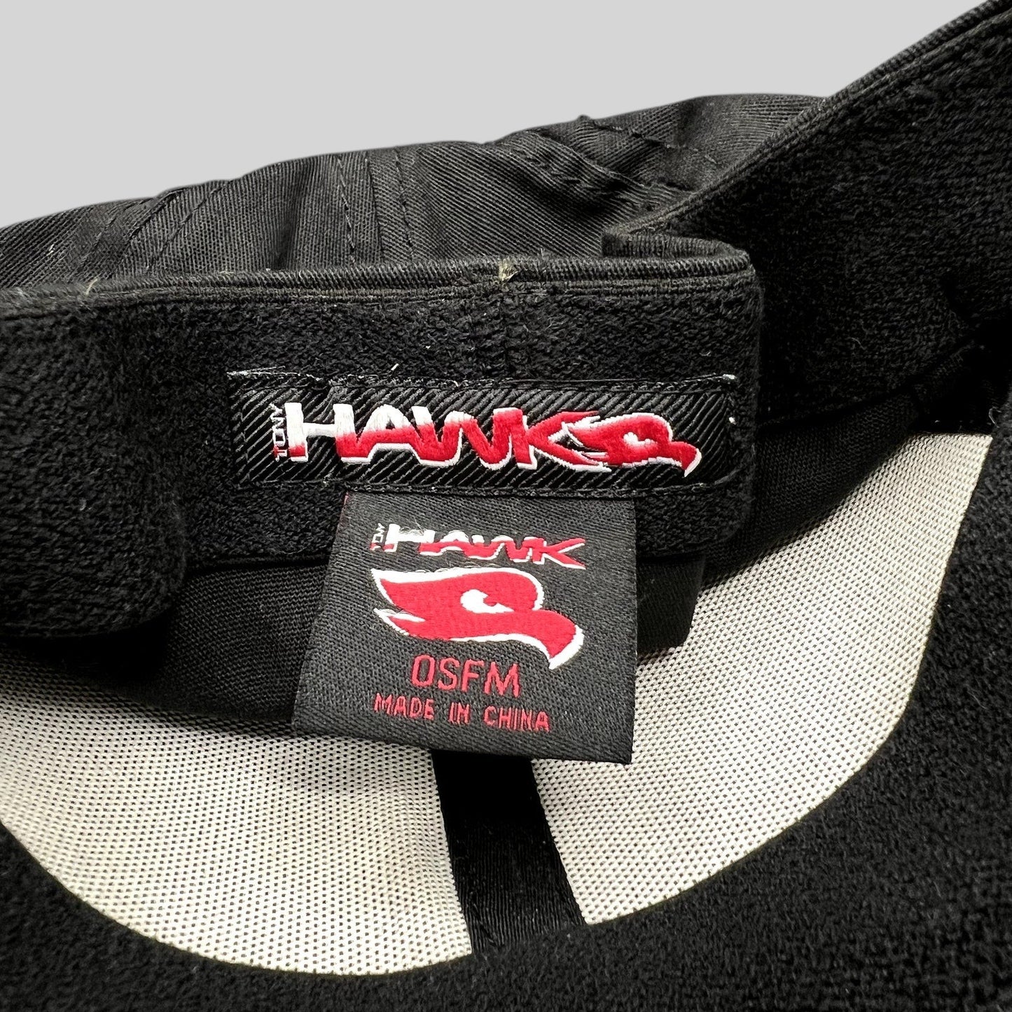 Raree Finds Tony Hawk strapback hat interior showing brand logo tag and red hawk icon on black fabric
