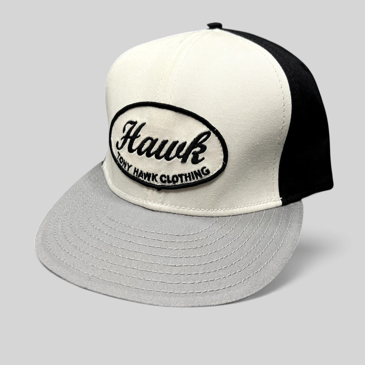 Raree Finds Tony Hawk Clothing black and white strapback hat with an embroidered oval Hawk script logo patch