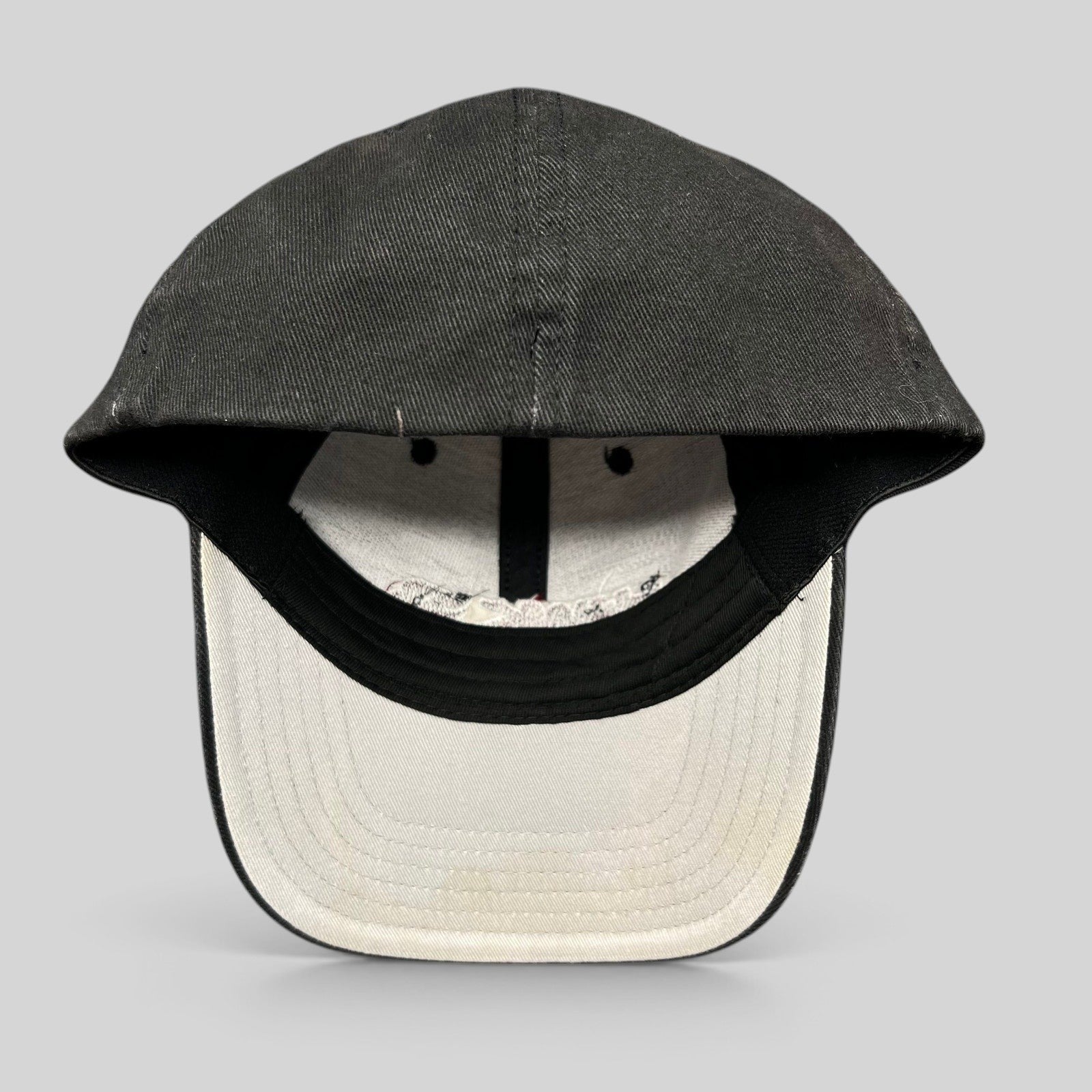 Raree Finds youth Tony Hawk fitted skate hat in black cotton with white interior lining and embroidered logo detail