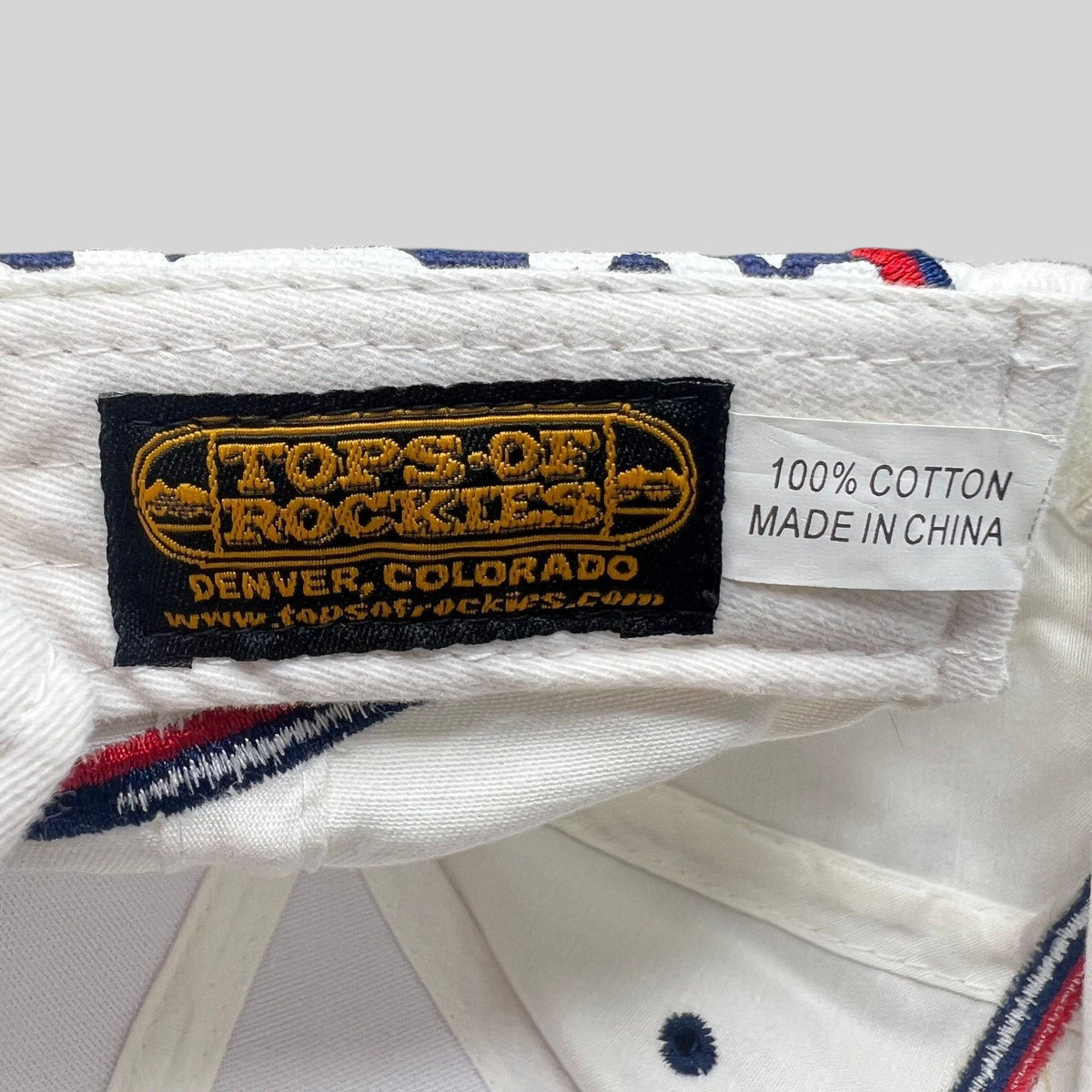 Raree Finds Top Of The Rockies 2004 Desperado Golf Classic hat interior brand label and 100% cotton tag