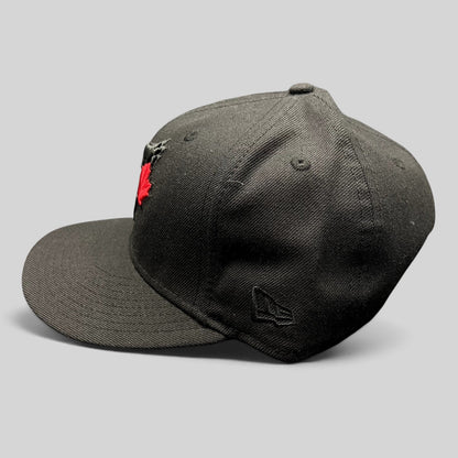 Raree Finds New Era Toronto Blue Jays black snapback hat with a red maple leaf logo and flat brim