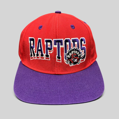 Raree Finds vintage Toronto Raptors Adidas Hardwood Classics snapback hat in red and purple with embroidered logo