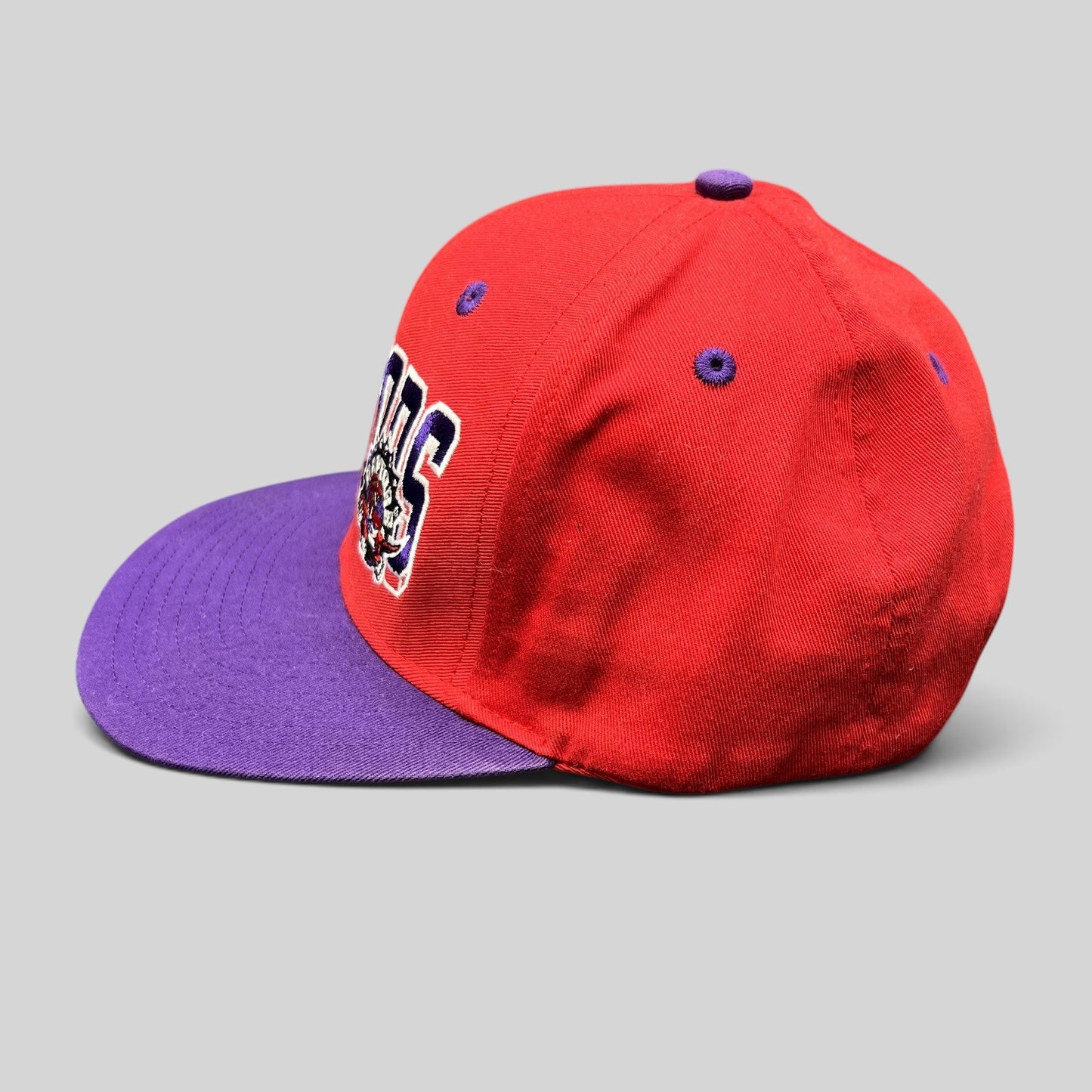 Raree Finds vintage Toronto Raptors Adidas Hardwood Classics snapback hat in red and purple with embroidered logo