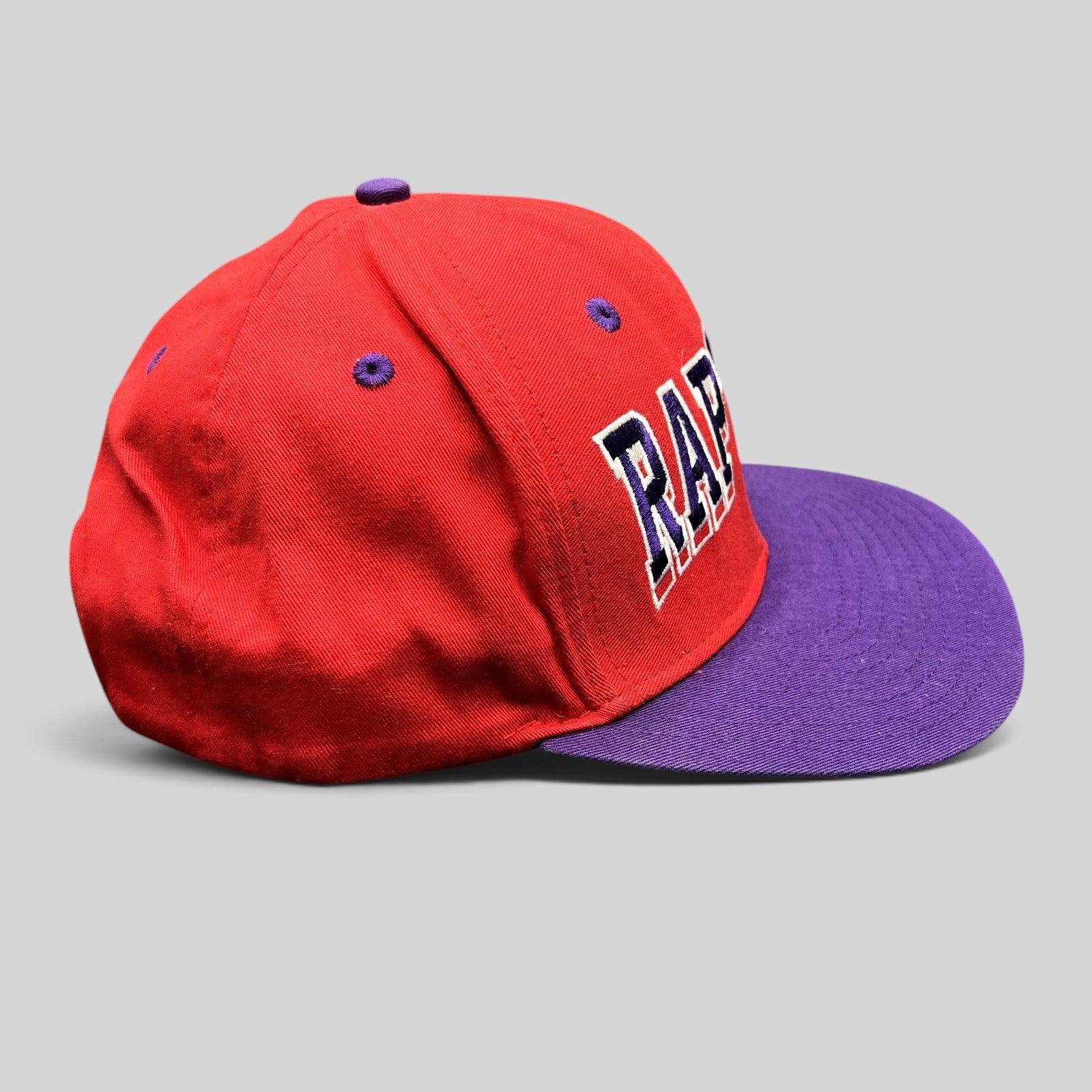 Raree Finds vintage Adidas Toronto Raptors NBA snapback hat in red and purple with embroidered Raptors lettering