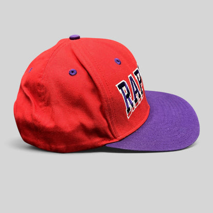 Raree Finds vintage Adidas Toronto Raptors NBA snapback hat in red and purple with embroidered Raptors lettering
