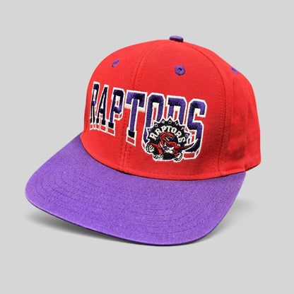Raree Finds vintage Toronto Raptors Adidas Hardwood Classics snapback hat in red and purple with embroidered logo.