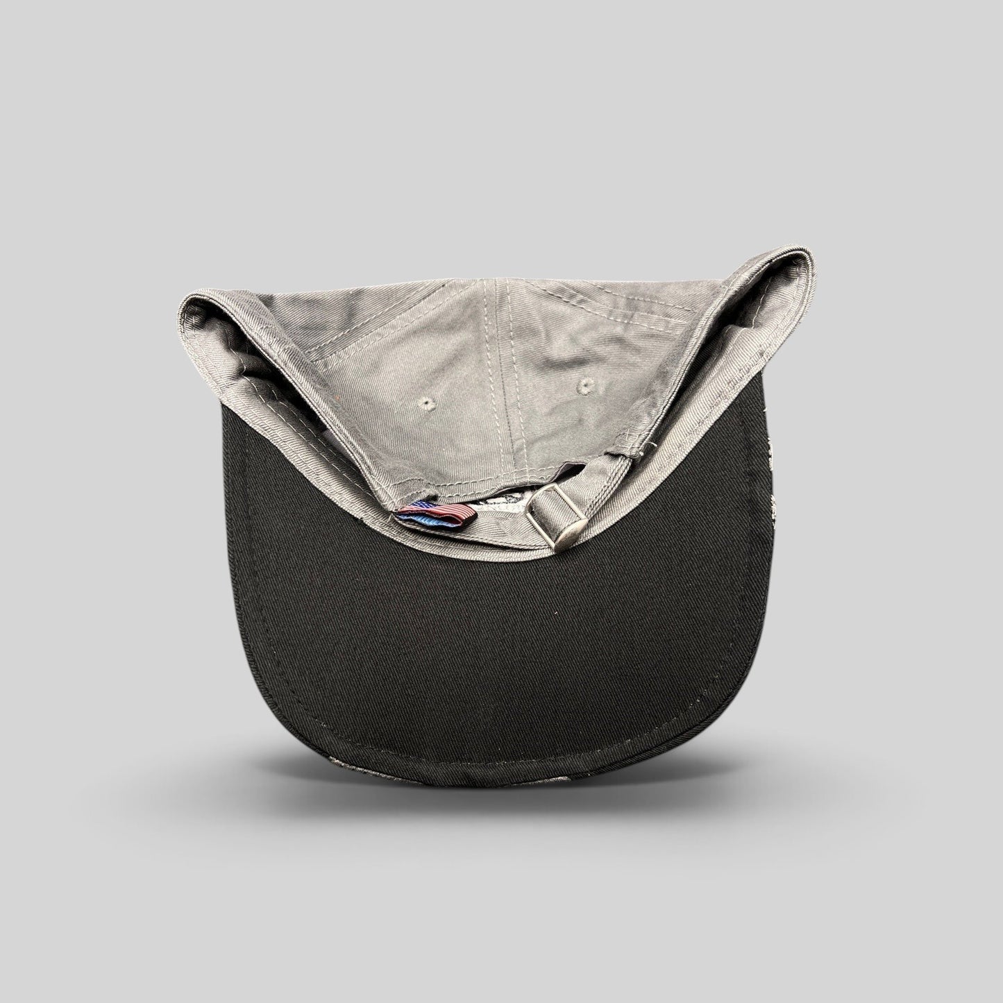 Raree Finds Toyota Tundra Trucks cap in black and gray with an adjustable strapback closure and interior tag detail.