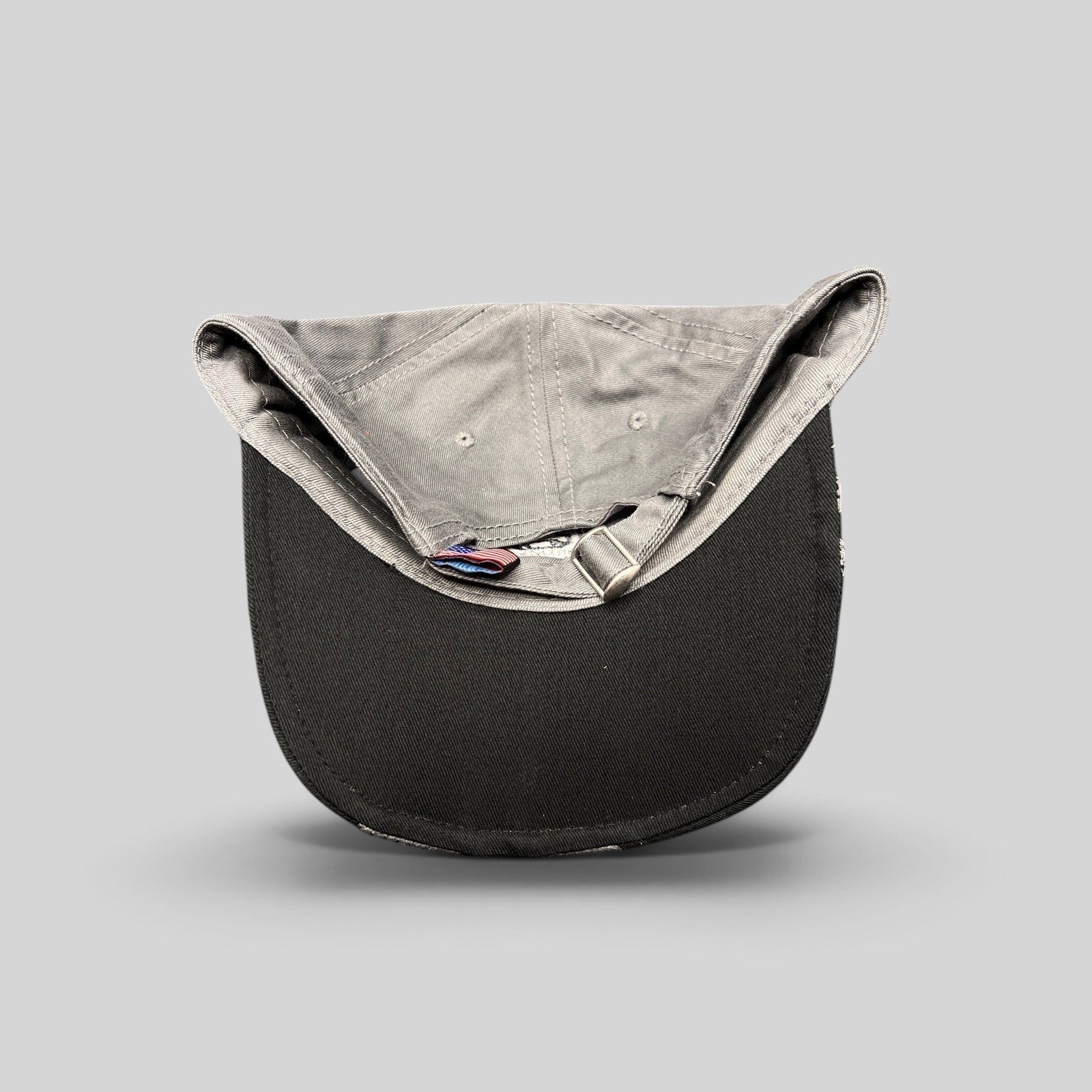 Raree Finds Toyota Tundra Trucks cap in black and gray with an adjustable strapback closure and interior tag detail.