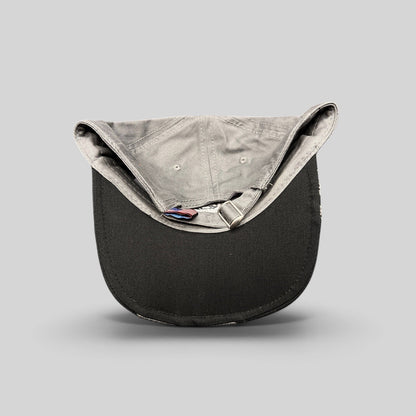 Raree Finds Toyota Tundra Trucks cap in black and gray with an adjustable strapback closure and interior tag detail.