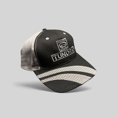 Raree Finds black and gray Cobra structured cap featuring an embroidered Toyota Tundra Trucks logo and mesh brim detail.