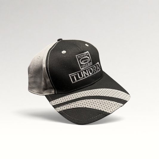 Raree Finds black and gray Cobra structured cap featuring an embroidered Toyota Tundra Trucks logo and mesh brim detail.