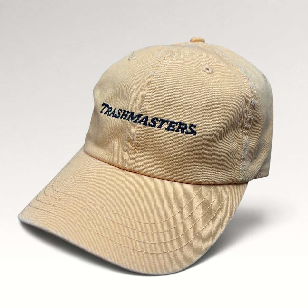 Raree Finds vintage tan cotton dad cap with Trashmasters embroidered script logo on the front