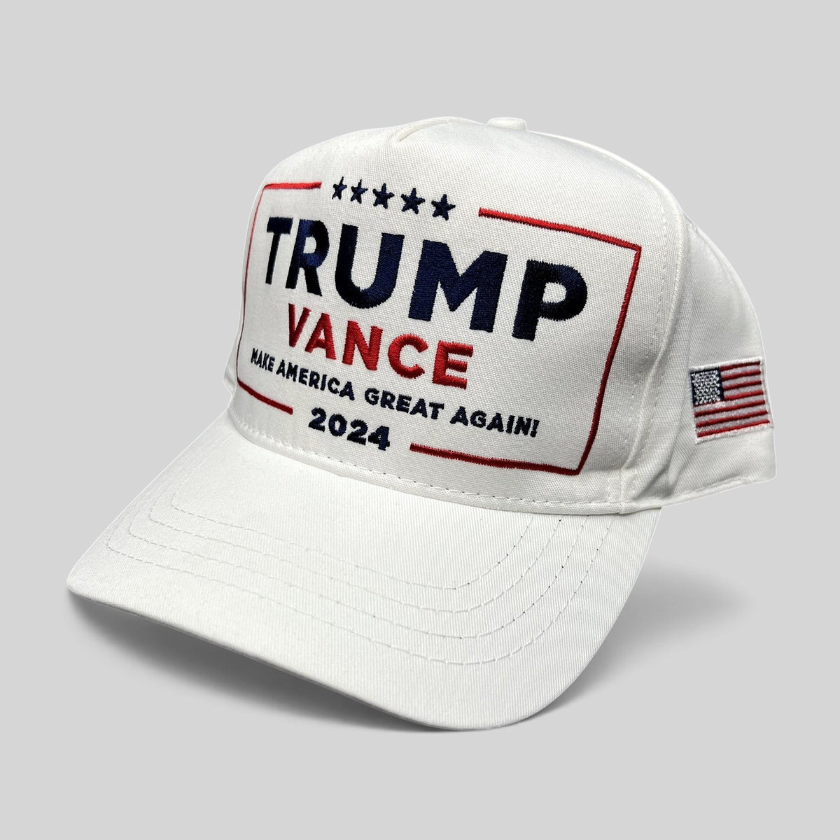 Raree Finds white Trump Vance 2024 snapback hat with red, white, and blue embroidery and American flag side detail.