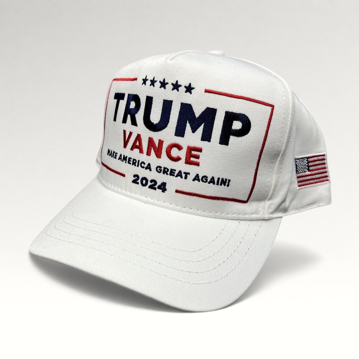 Raree Finds white Trump Vance 2024 snapback hat with red, white, and blue embroidery and American flag side detail.