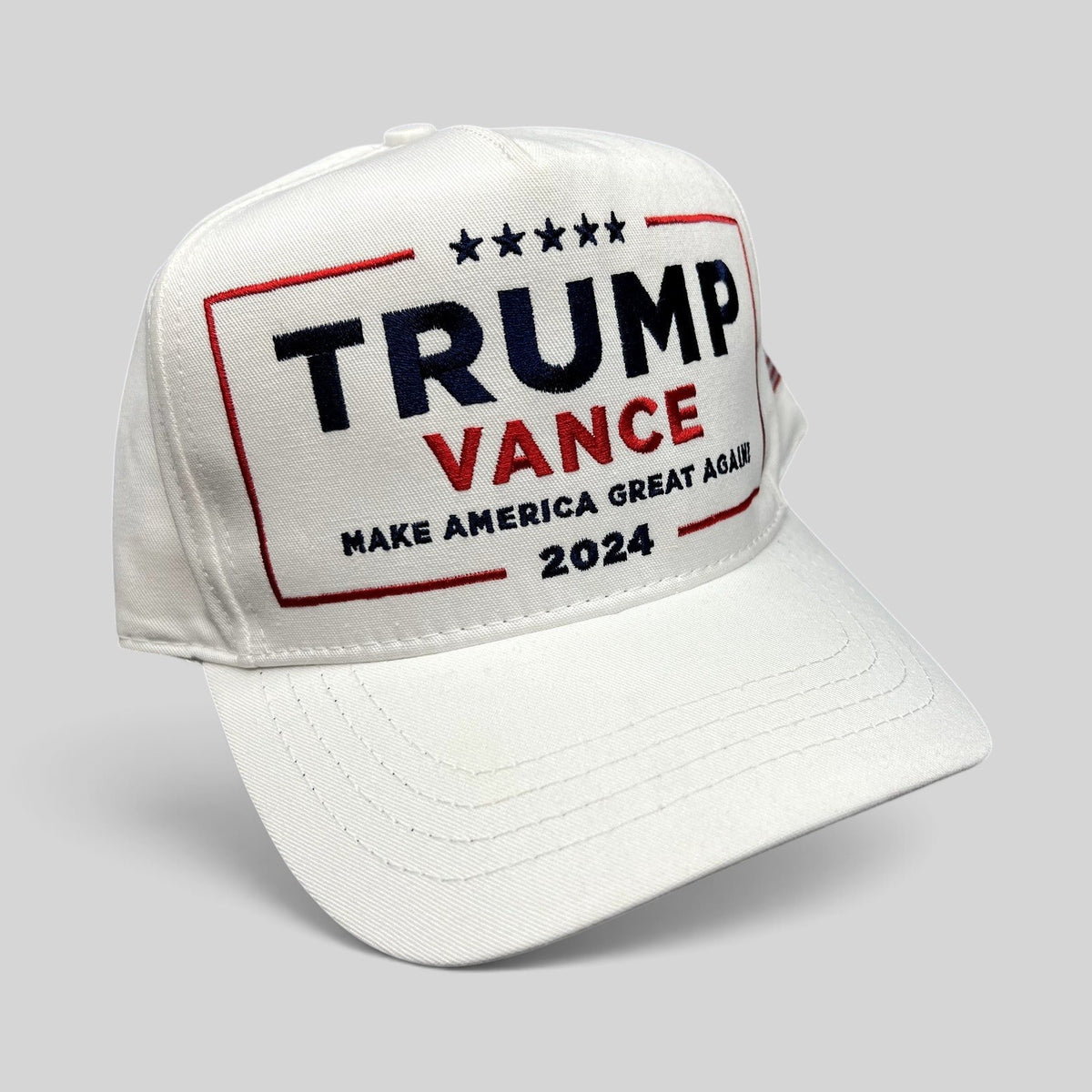 Raree Finds white Trump Vance 2024 snapback hat with red and blue embroidered campaign slogan and structured crown.