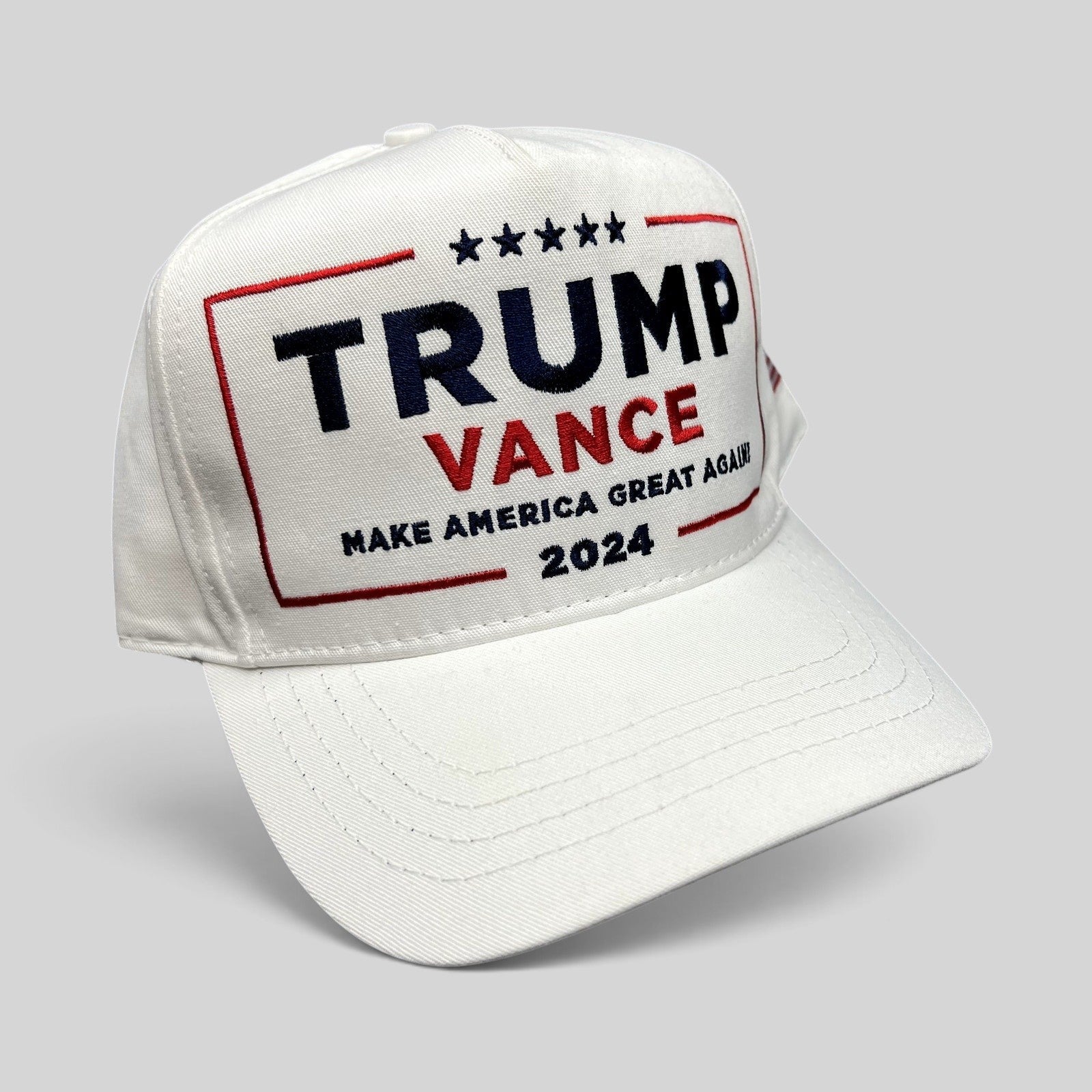 Raree Finds white Trump Vance 2024 snapback hat with red and blue embroidered campaign slogan and structured crown.