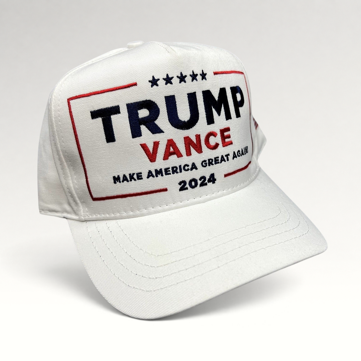 Raree Finds white Trump Vance 2024 snapback hat with red and blue embroidered campaign slogan and structured crown.