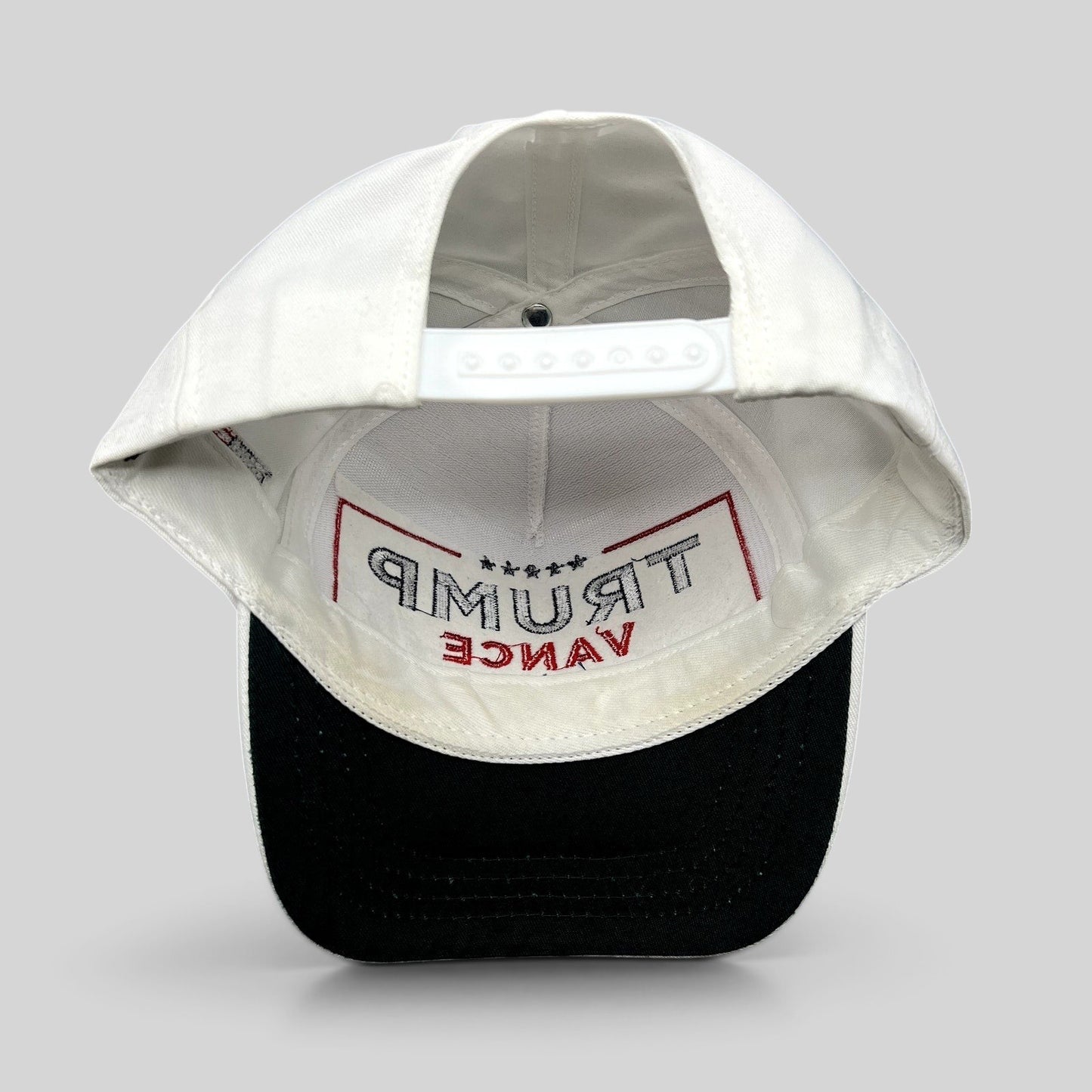 Raree Finds Trump Vance 2024 snapback hat interior view showing white structured crown and black brim