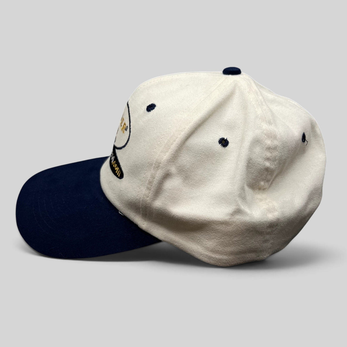 Raree Finds vintage Turner New Zealand snapback hat in white cotton with a navy blue brim and embroidered logo.