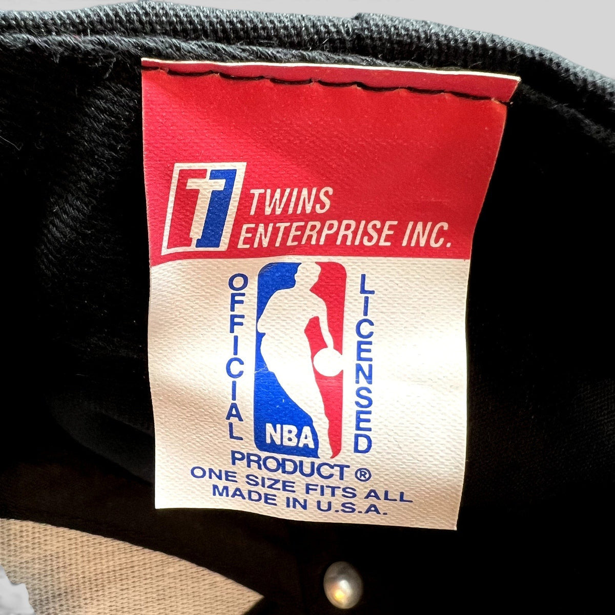 Raree Finds vintage Twins Enterprise NBA licensed product tag inside a Miami Heat snapback hat made in the USA.