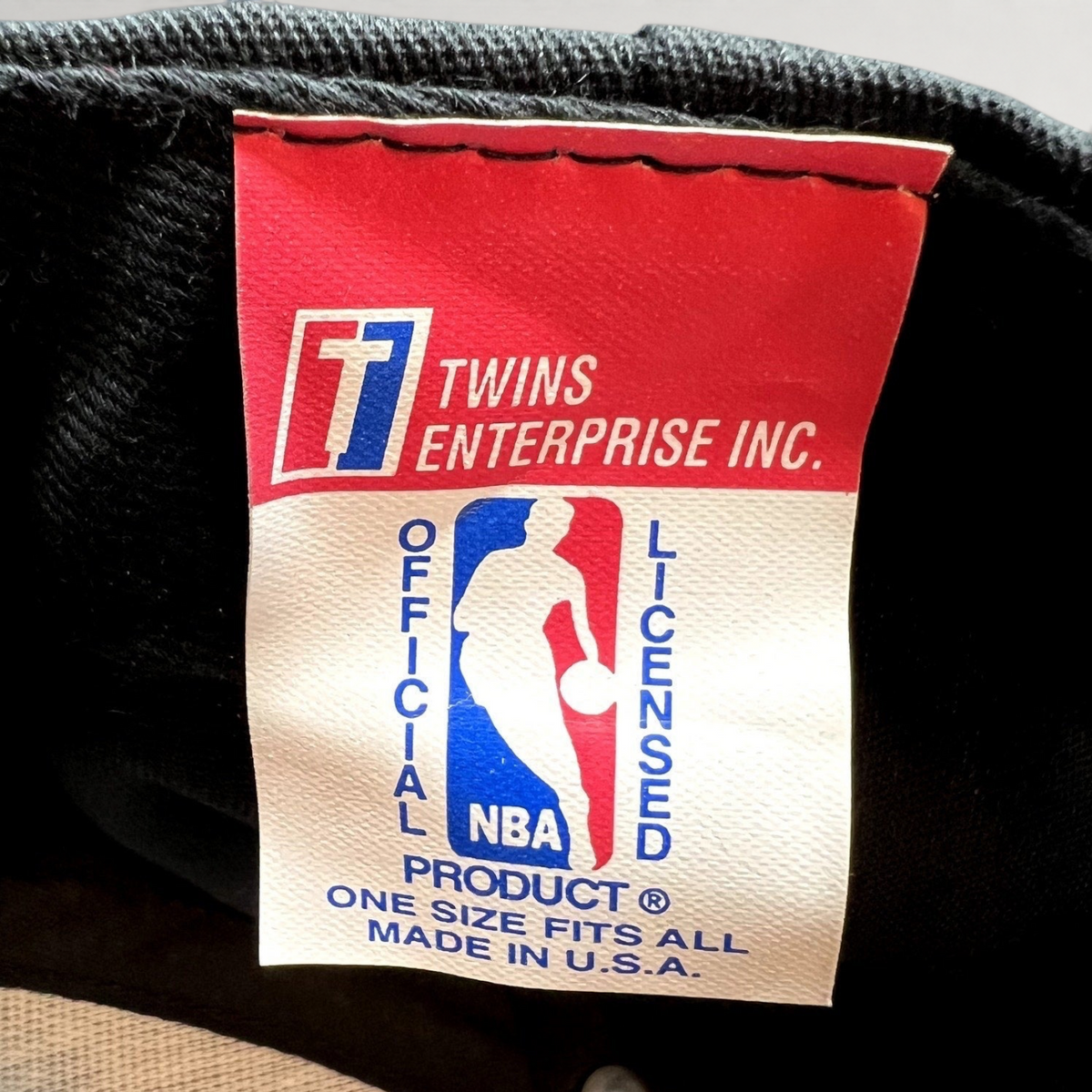 Raree Finds vintage Twins Enterprise NBA licensed product tag inside a Miami Heat snapback hat made in the USA.