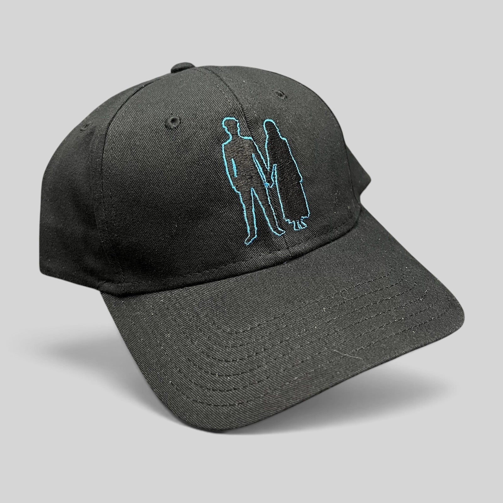 Raree Finds black U2 Experience + Innocence tour strapback hat with blue embroidered silhouette design on the front
