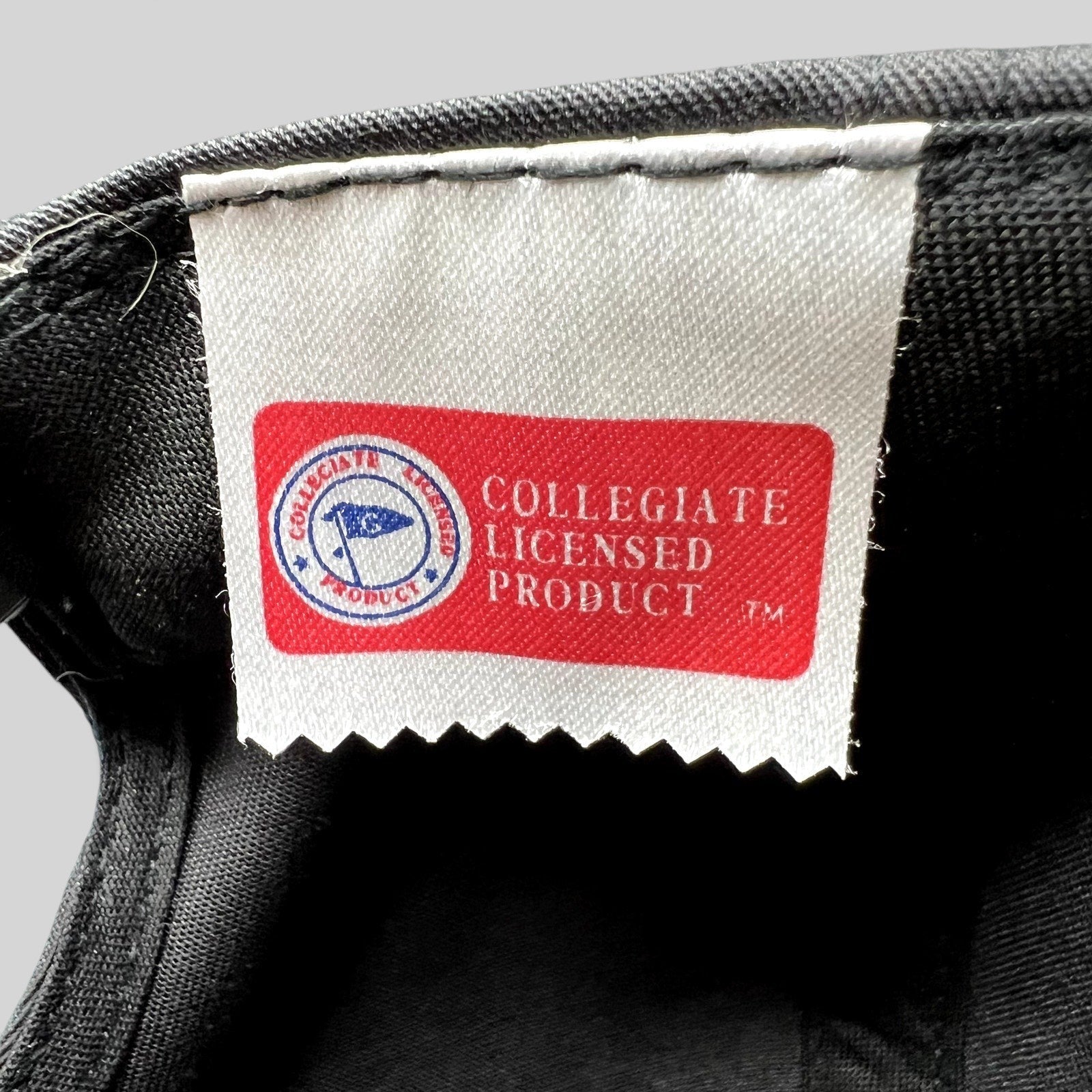 Raree Finds vintage UCLA Bruins snapback hat interior tag showing Collegiate Licensed Product branding