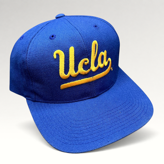 Raree Finds vintage UCLA Bruins royal blue snapback hat with gold script embroidery and structured six-panel design