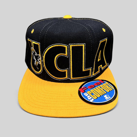 Raree Finds vintage UCLA Bruins Starter flex fit hat in navy and gold with oversized wraparound embroidered logo.