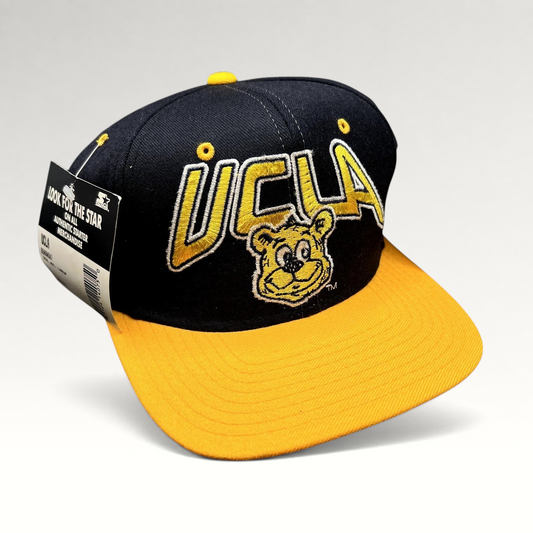Raree Finds vintage UCLA Bruins wool snapback hat in navy and gold with embroidered bear mascot and Starter tag.
